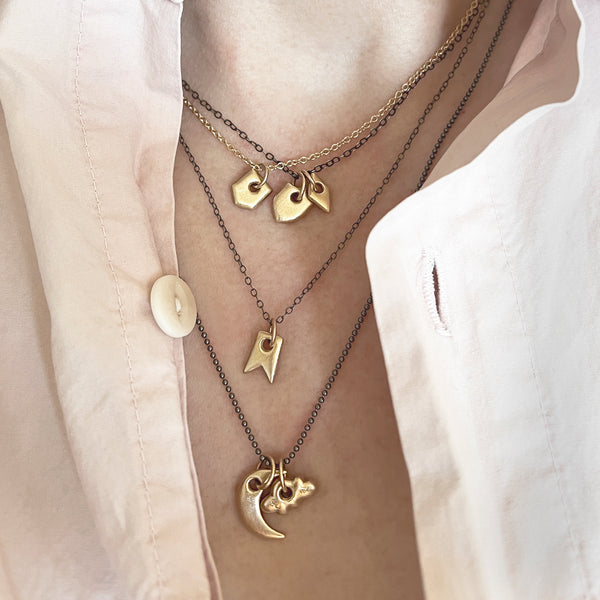 Tiny Swiss Shield Charm – Melissa Easton